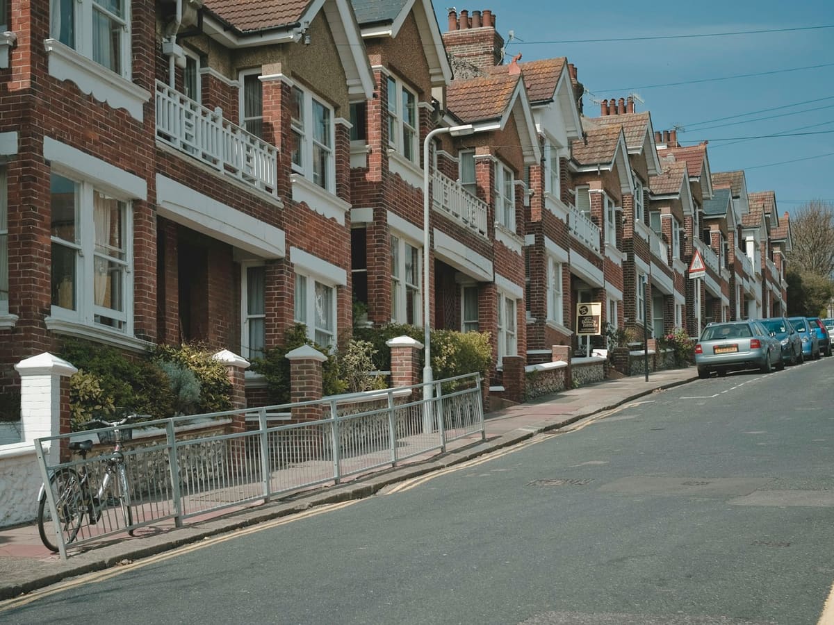 A street of bay-fronted terraced houses